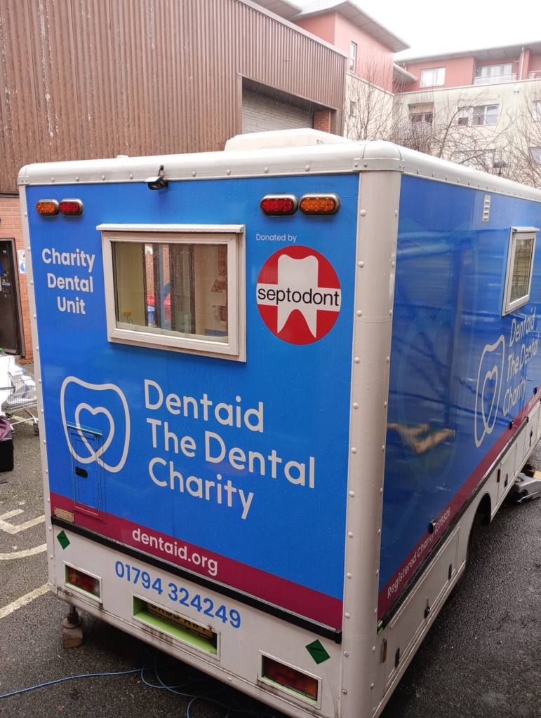 Dentaid's van parked in Emmaus Bristol's yard